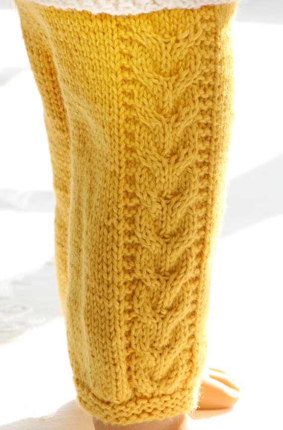 Knitting patterns 
for dolls dresses