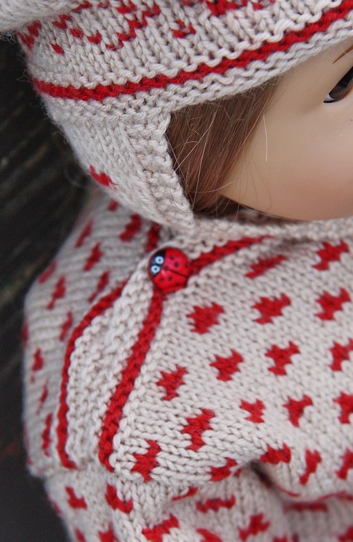 Knit doll dress with this lovely doll knitting pattern