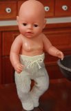 Lovely doll knitting pattern to your Baby born
