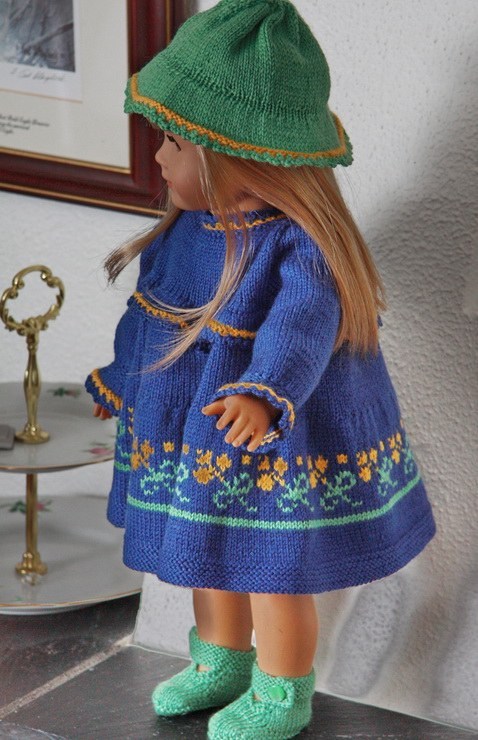 Lovely doll knitting pattern to your Baby born