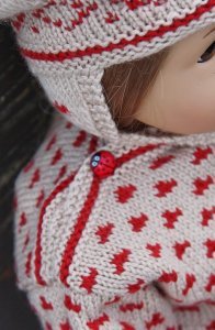 Knit doll dress with this lovely doll knitting pattern