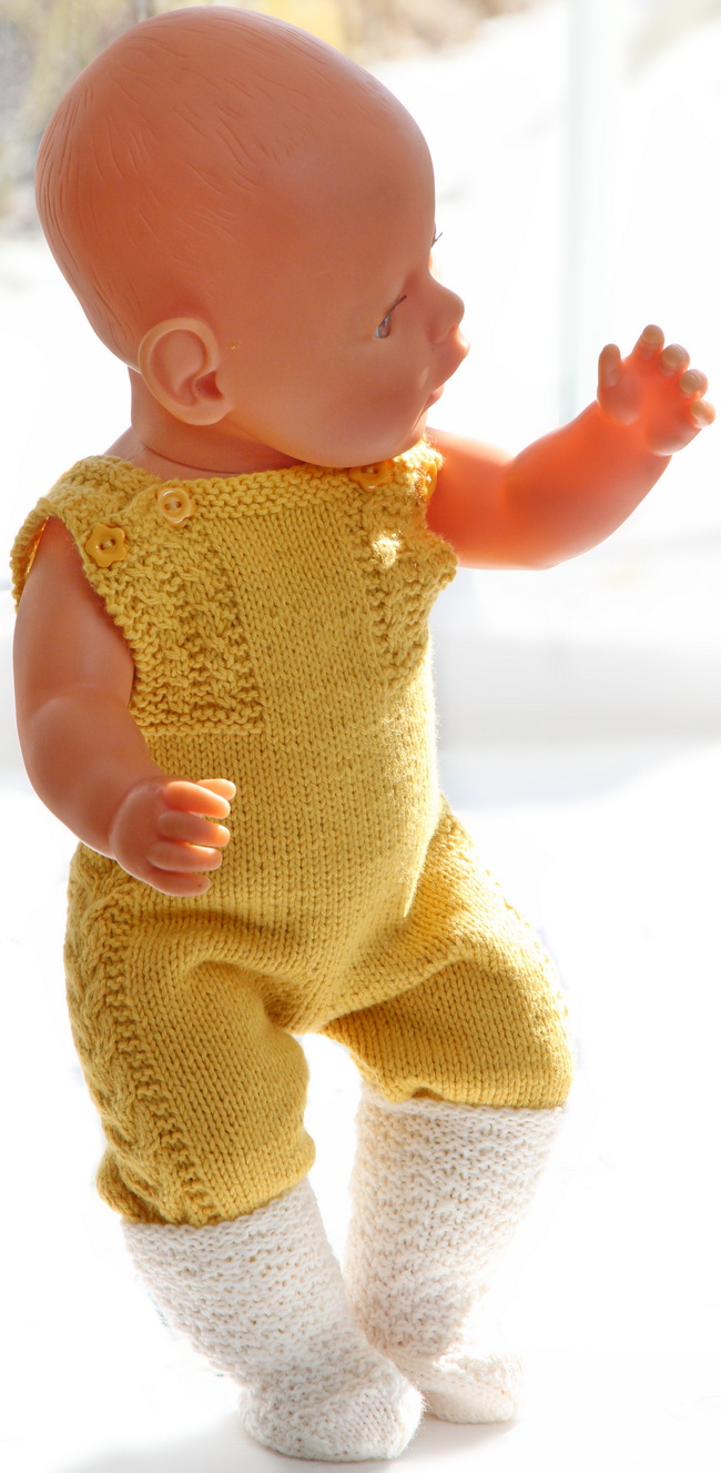 Knitted as fashionable knickers, they offer a playful yet practical element to the doll's wardrobe