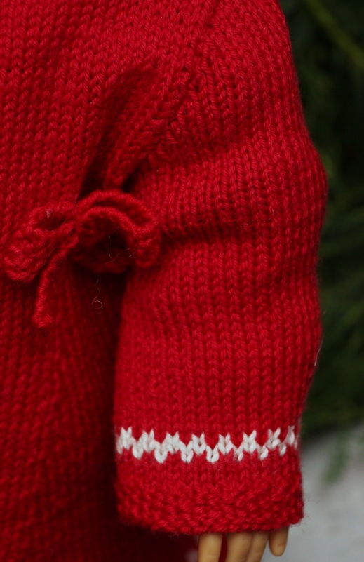 Knit a lovely Christmas dress  for your doll