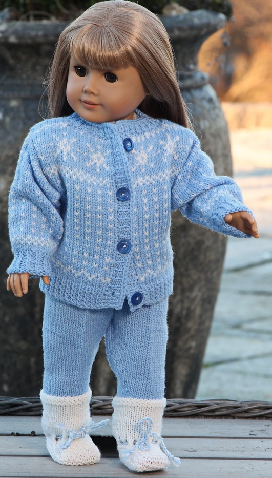 Beautiful outfit for your doll  in light blue with snowflakes