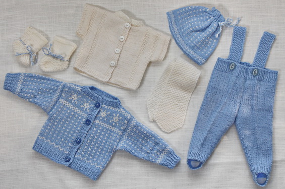 Beautiful outfit for your doll  in light blue with snowflakes