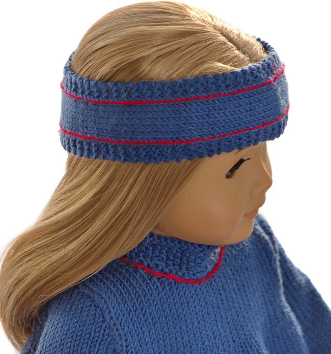 A cute hairband in blue has red striped sewed in red inside the garter sts at each side.