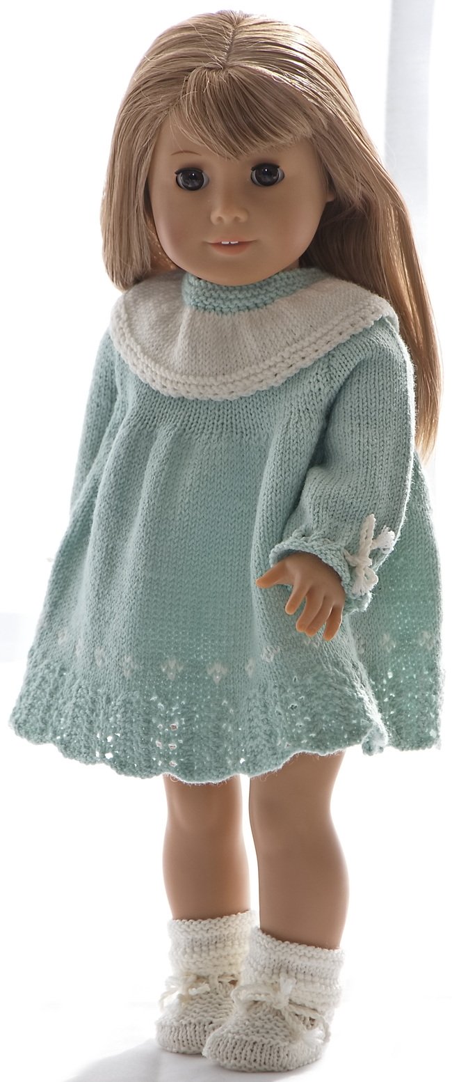 This time I designed a beautiful dress knitted in turquoise. It is knitted in stocking sts and wrinkled under the yoke.