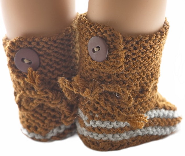 A pair of brown shoes look nice as accessories to complete this outfit. The shoes are buttoned back and have cords bound in bows under the buttoning back.