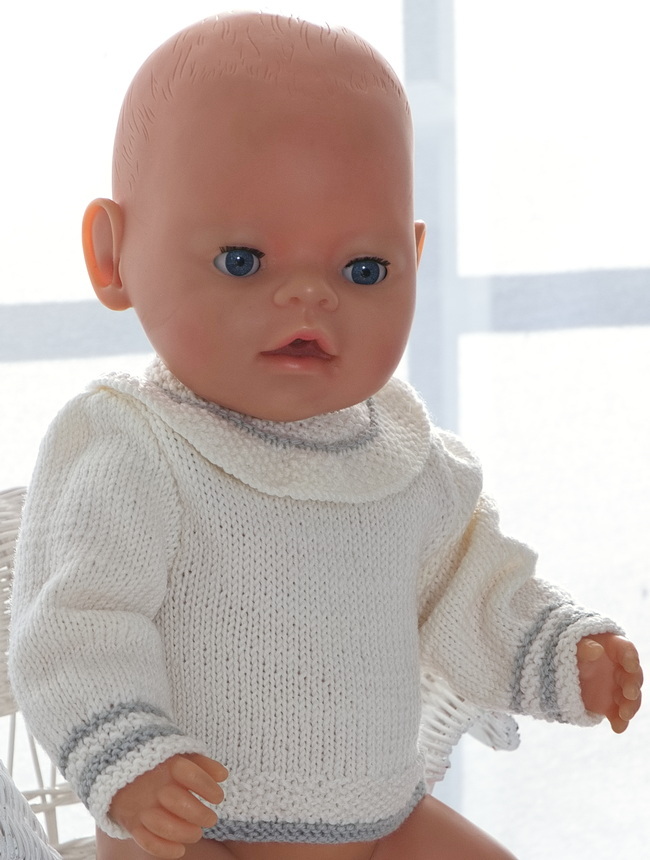 For Emil, I have knitted a lovely, simple white sweater. The edges are knitted