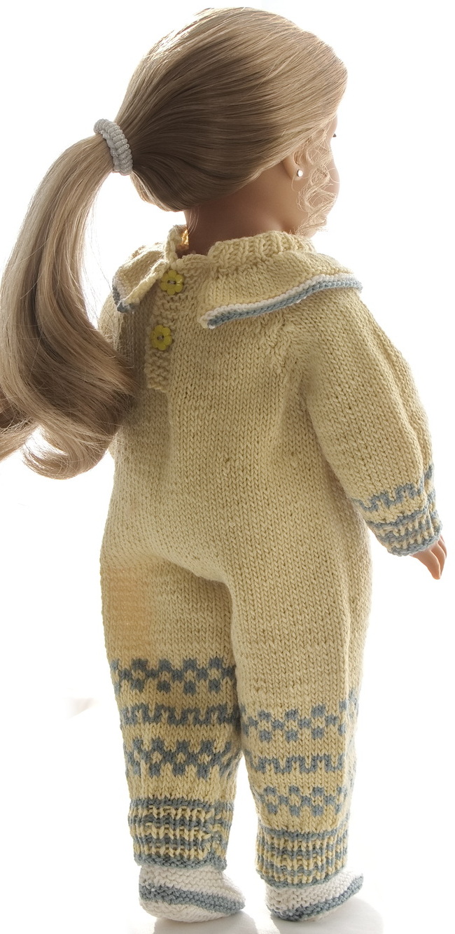 A delightful view from behind showcases the intricate grey patterns on the legs and the charming button closures, highlighting the thoughtful detail in Danielle’s suit.