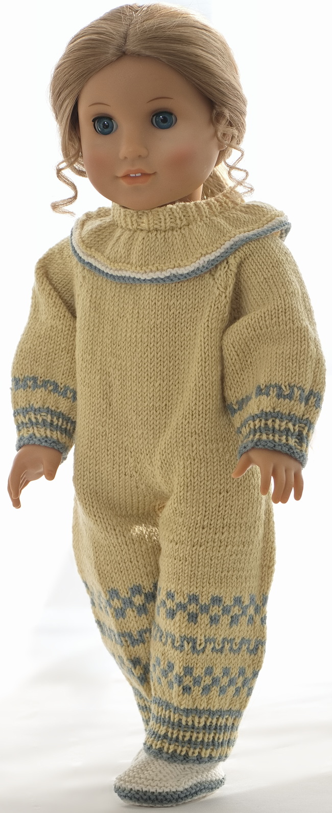 American Girl Doll: Danielle’s easy-knitted doll clothes pattern comes beautifully together on your American Girl doll, highlighting a playful yet sophisticated look.