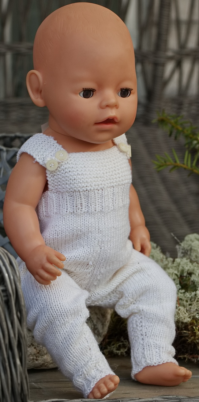 ... buttoned with suspenders on the shoulders.