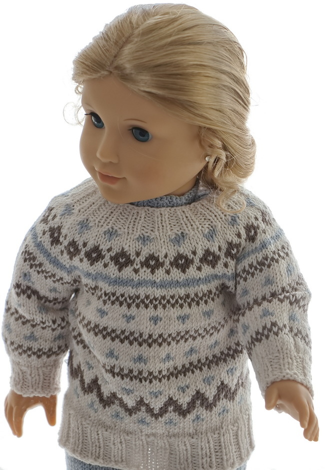 . It is decreased around in the round around the shoulders, and it is buttoned back.