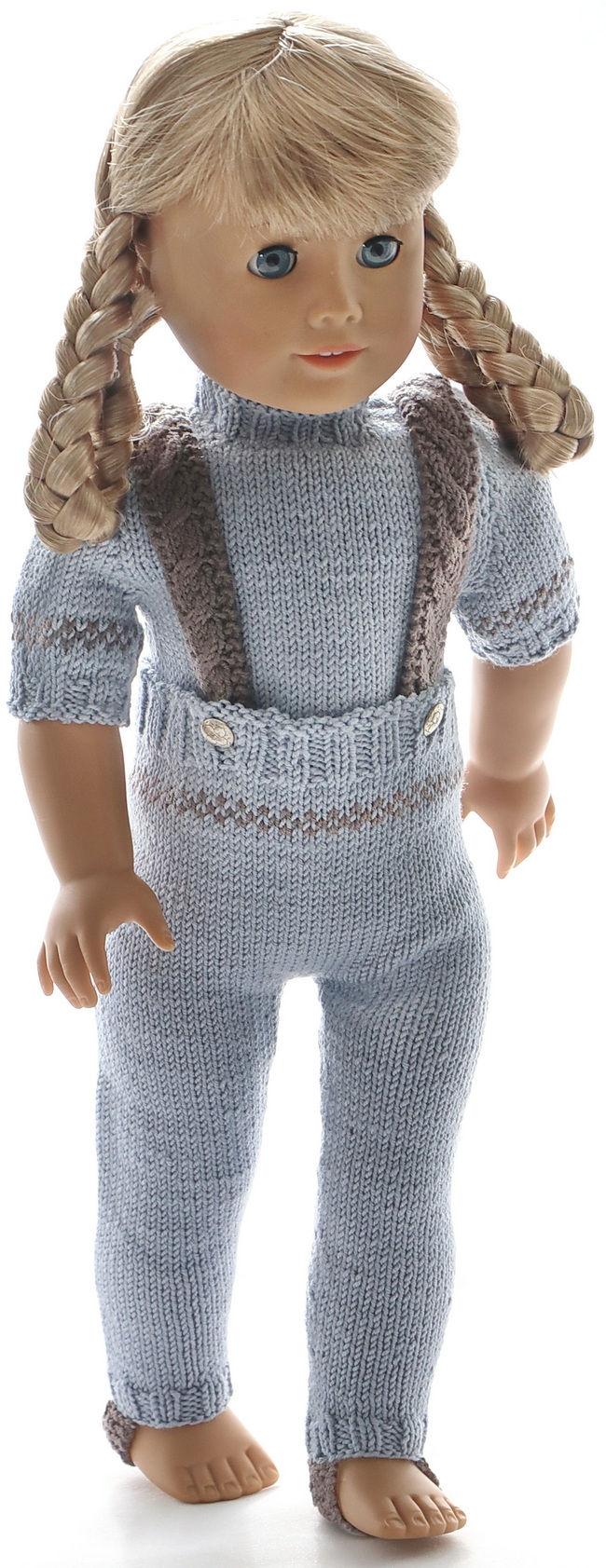 The pants are knitted in grey with a yoke back and suspenders knitted in brown and buttoned front. It has a small brown pattern around the waist. The pants are fashioned like stretch pants and have straps under the feet.