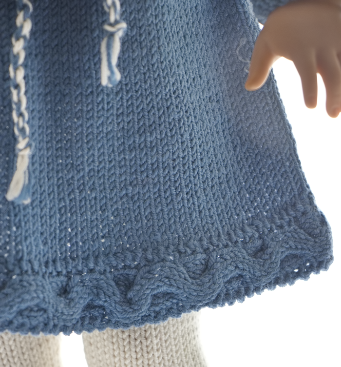 Complete Synne doll knitting pattern set in blue, white and brown.