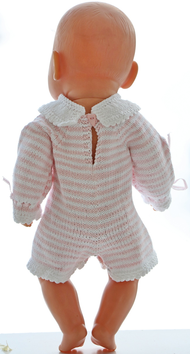 Body wear under the outfit introduces a playful element with its striped design, alternating between pink and white. The long sleeves and cute collar add a layer of sophistication, making it a versatile piece for any doll's wardrobe.