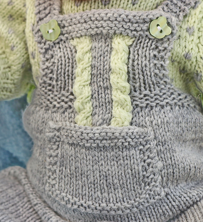 ... twining upwards along the yoke to the top, accentuating the outfit’s texture and depth.